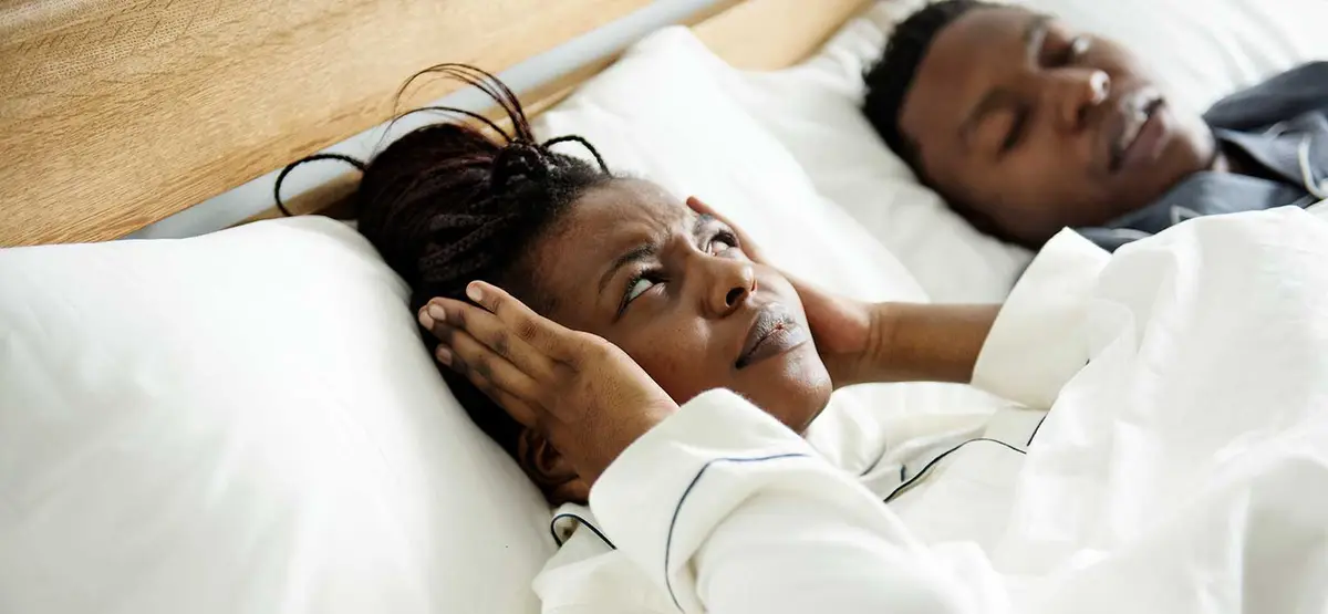 Patient sleeping peacefully, the goal of sleep apnea treatment at Elite Boca Dental